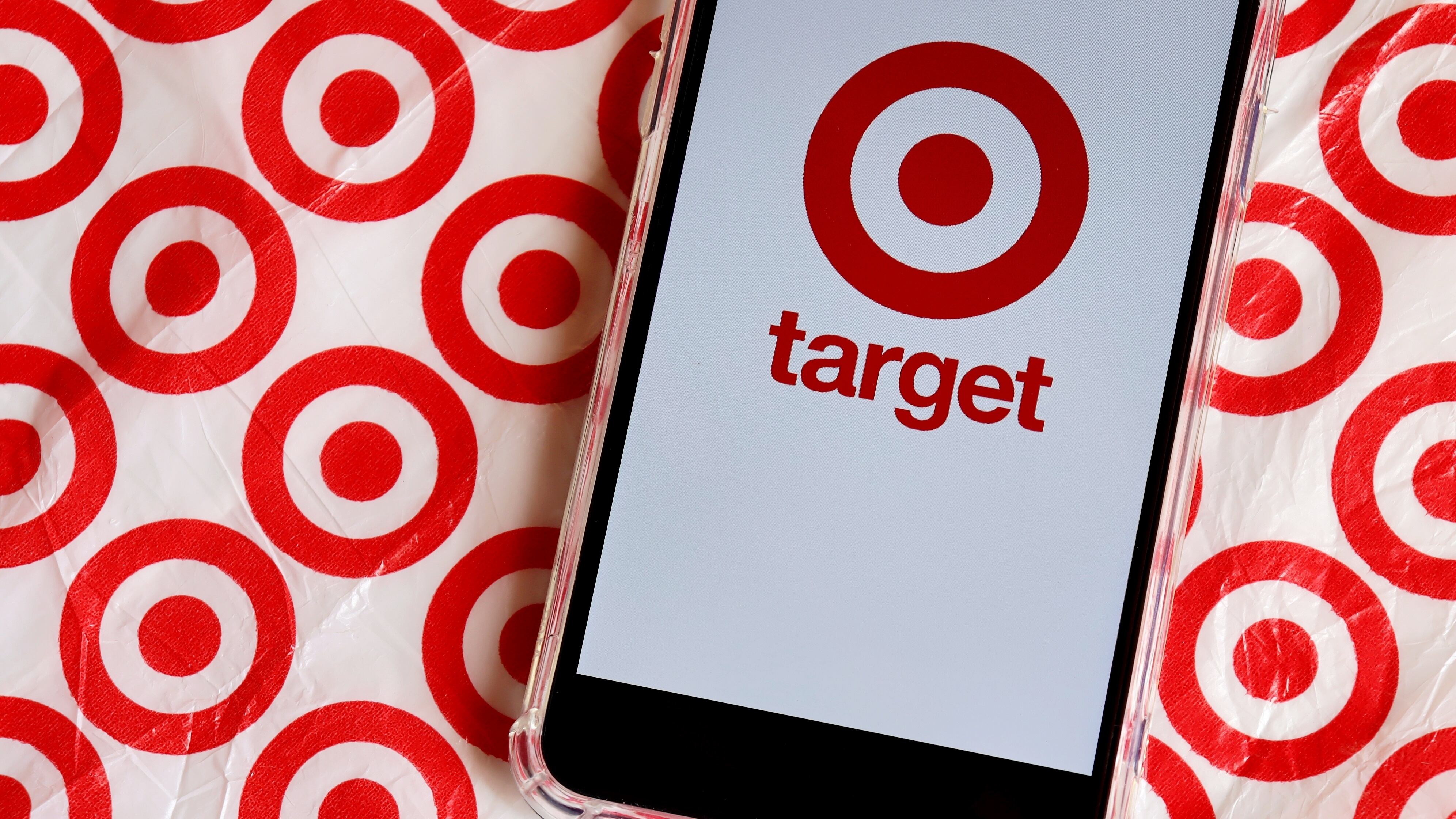 Target app on a phone and Target bag.